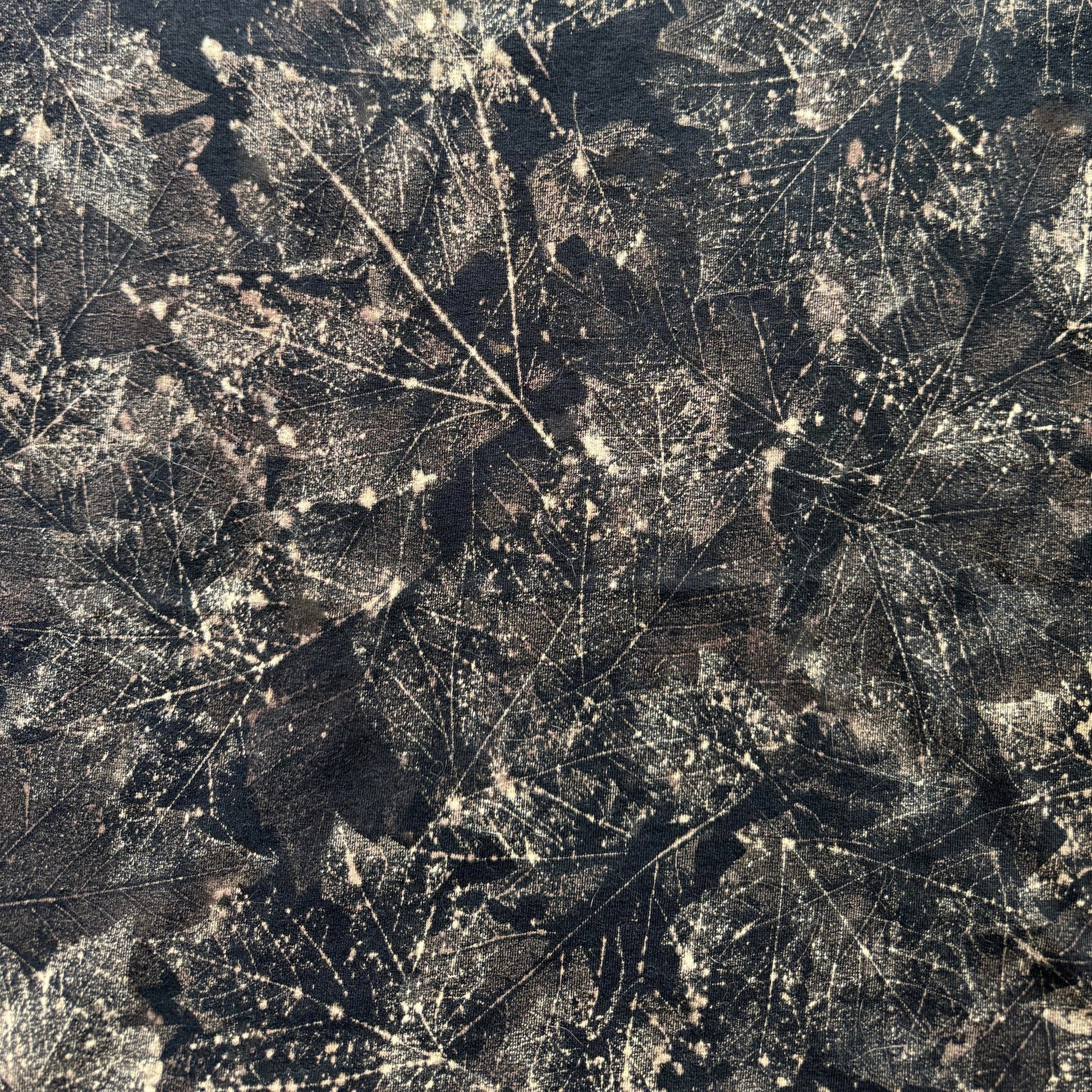 Close-up of a textured surface with leaf patterns